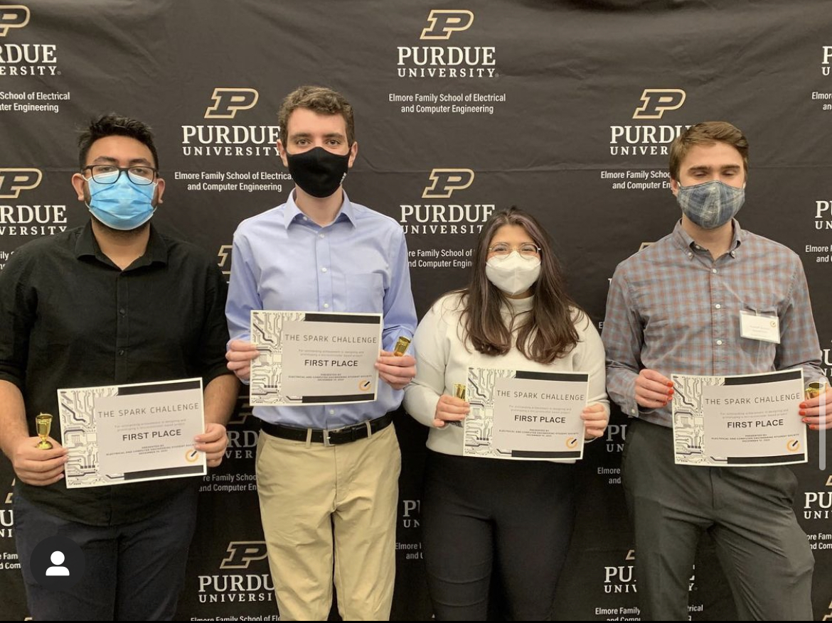 Award winning students holding certificates